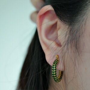 Green gem studded gold hoops